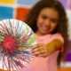 girl with spin art at Crayola